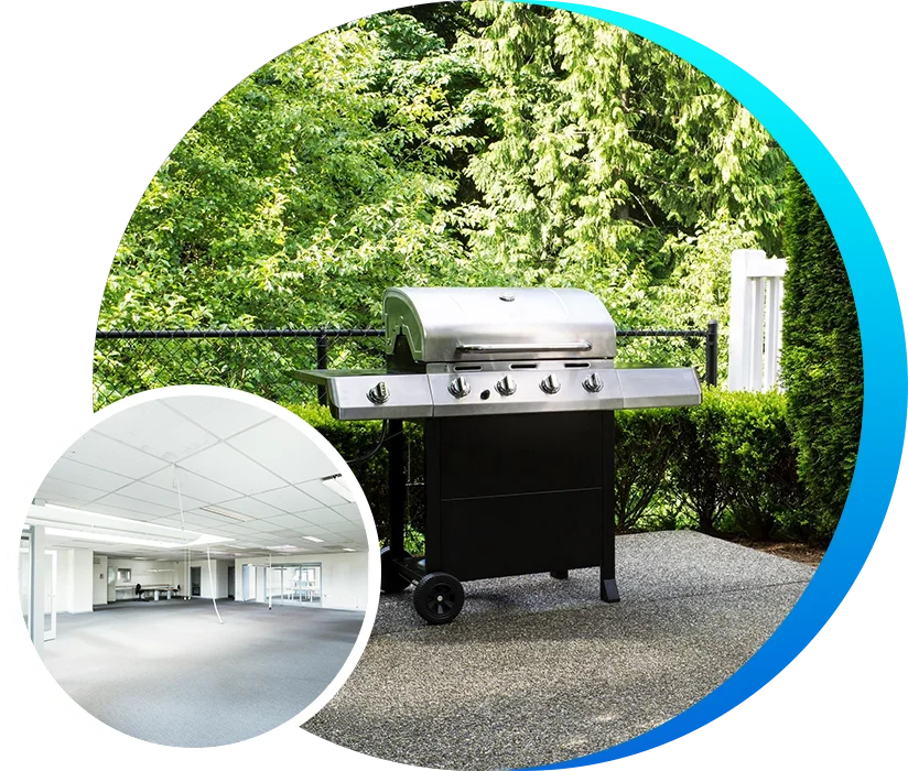 A grill sitting on top of a cement floor.